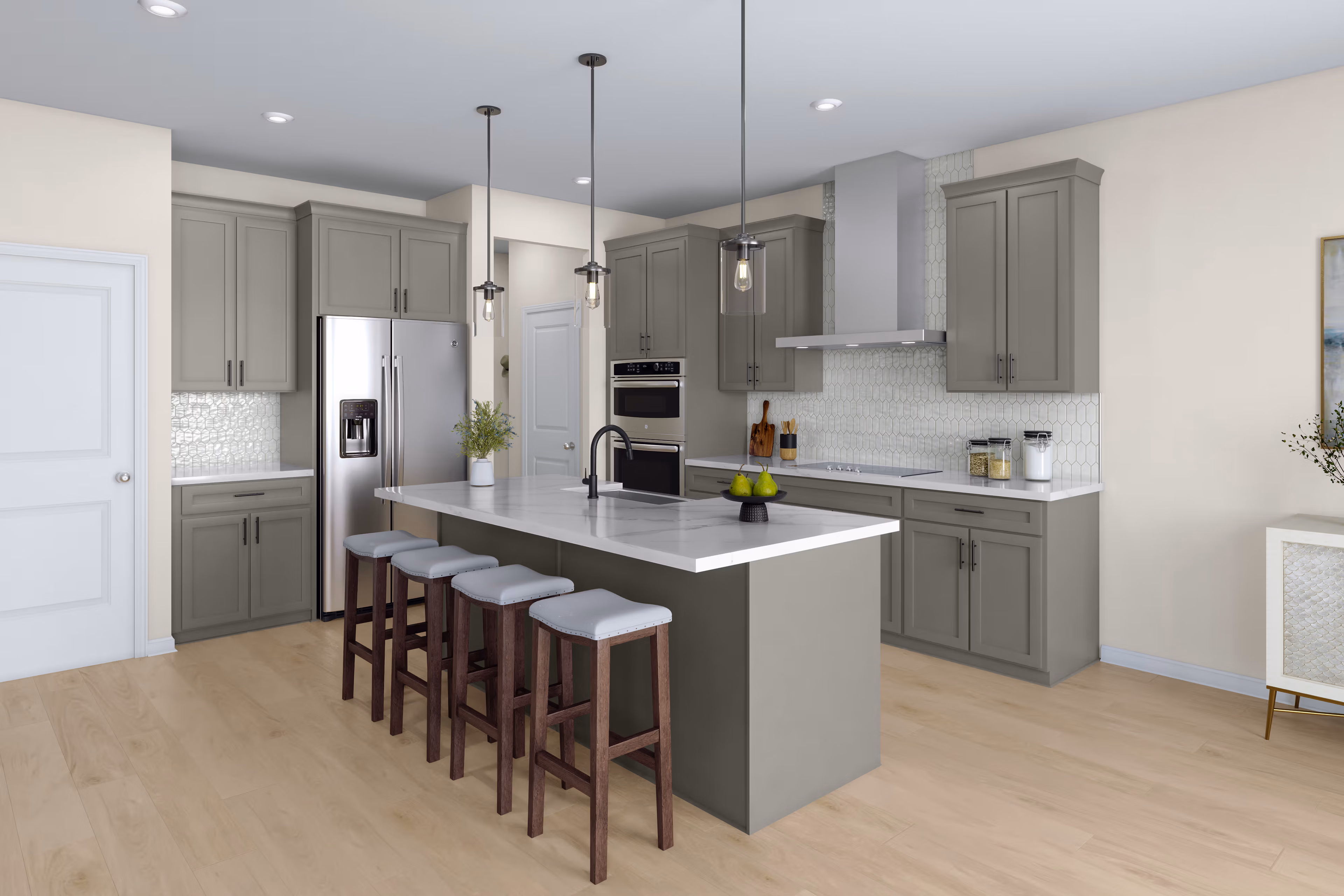 A modern, open-concept kitchen with gray cabinets, a central island with bar stools, and pendant lighting fixtures.